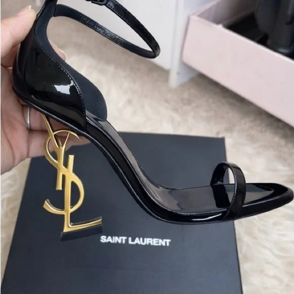 Yves Saint Laurent Black Heels with Gold Logo Accent - Picture 5 of 6